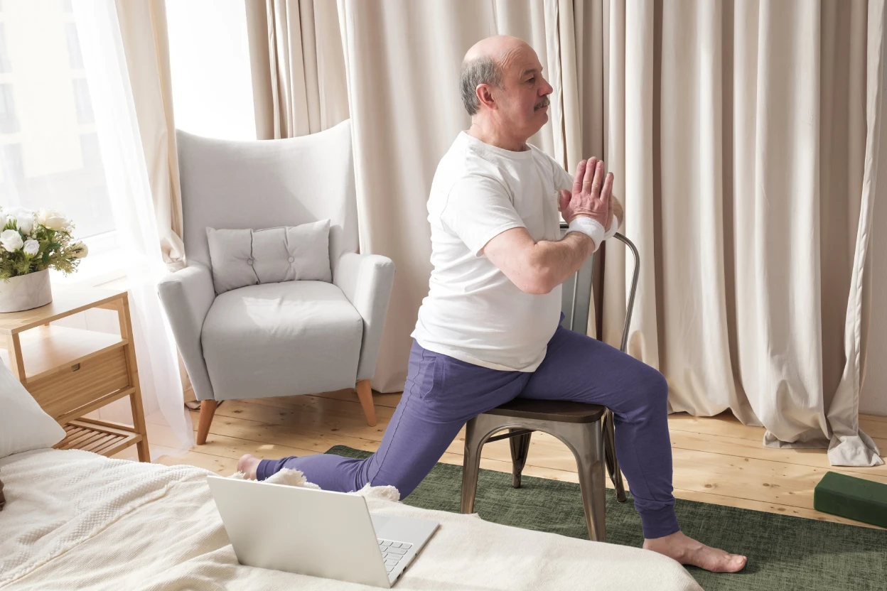 Older adult practicing yoga